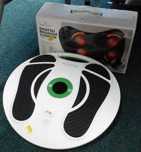 A boxed Revitive foot massager, and a Shiatsu massager cushion.