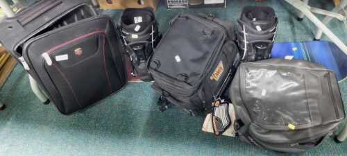 A Reoctor snowboard, UK size 10 boots, together with an Ellehammer flight bag, a Performance...