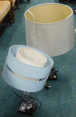 A reading lamp, made from Perspex spheres, light blue shade, together with a second similar...