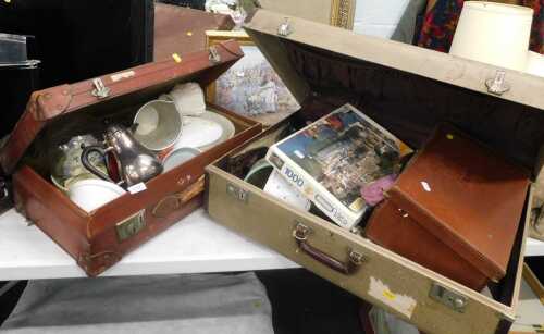 Housewares and ceramics, to include vases, bowls, flatware, etc., contained within two...