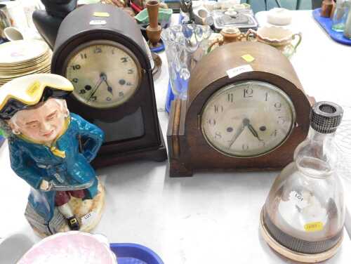 Clocks, an early 20thC wooden cased mantel clock, together with another wooden cased mantel...