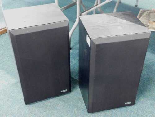 A pair of Interaudio by Bose upright stereo speakers, in black.
