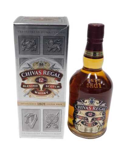 A bottle of Chivas Regal twelve year old blended Scotch whisky, in outer cardboard packaging.