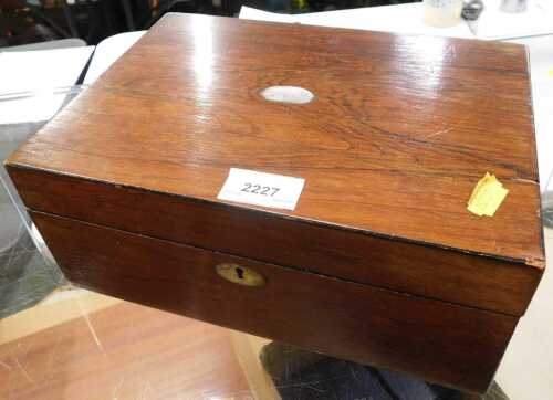 An early 20thC wooden jewellery box.
