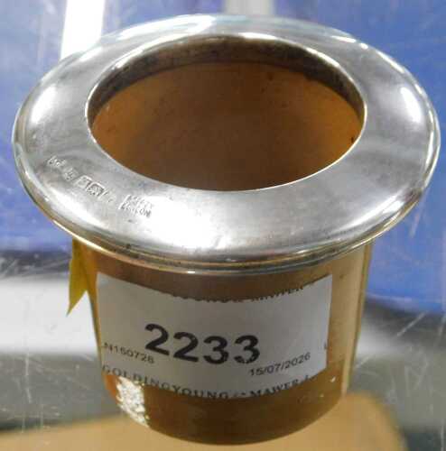 An Earthenware ink pot, with silver collar, marked Asprey of London.