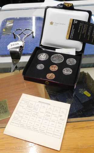 A cased Royal Canadian Mint Monnaie Royale coin set, in outer case, together with a pair of...