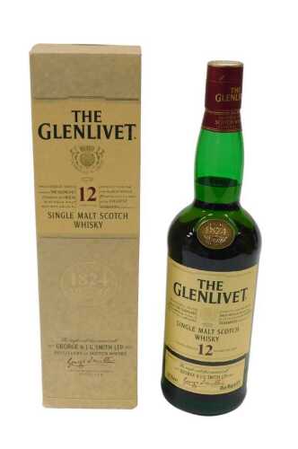 A bottle of Glenlivet twelve year old single malt Scotch whisky, in outer card packaging.