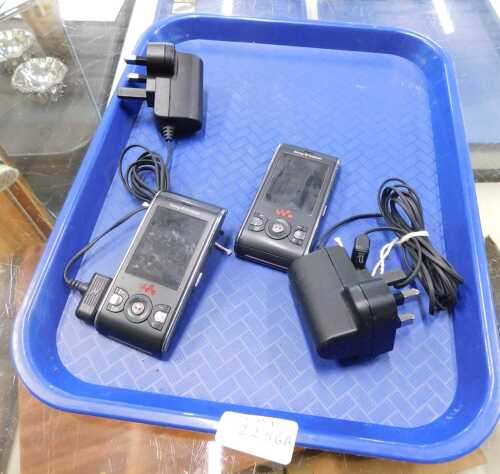 Two Sony Ericsson Vodaphone MP3 players.