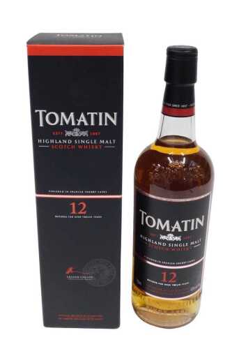 A bottle of Tomatin Highland single malt Scotch whisky, twelve years old, in outer card packaging.