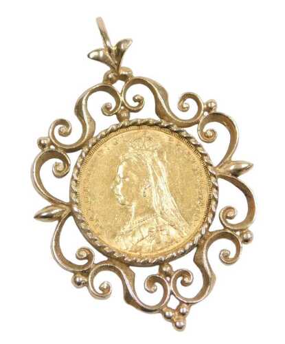 A Victorian full gold sovereign pendant, the young Victoria head dated 1889, in a 9ct gold...