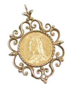 A Victorian full gold sovereign pendant, the young Victoria head dated 1889, in a 9ct gold...