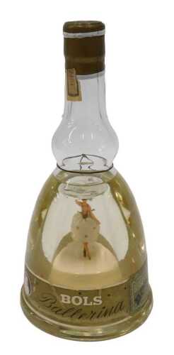 A bottle of Bols Gold Liquor Ballerina, with dancer and glitter to the inner bottle, 26cm high.