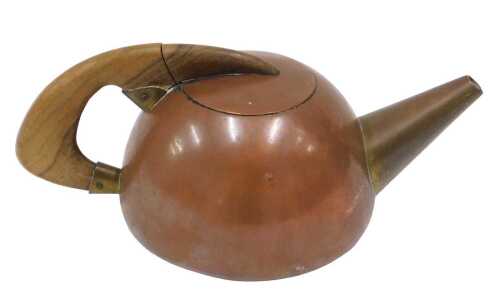 A mid-20thC Steinbock Austrian modernist copper teapot, with shaped wooden handle, marked...