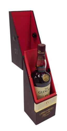 A bottle of Glenlivet single malt Scotch whisky, fifteen years old, in outer card packaging.