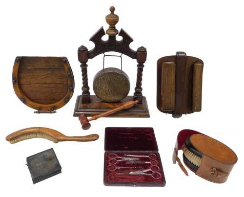 Various treen, leatherware, etc., and an oak dinner gong with brass centre, 46cm high, horseshoe...