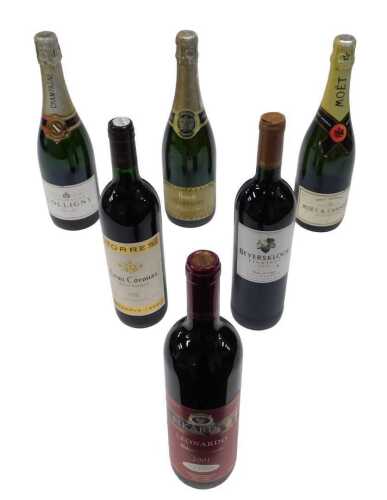 A bottle of Gran Coronas Cabernet Sauvignon Reserva 1999, a bottle of Colligny Champagne Brut,...