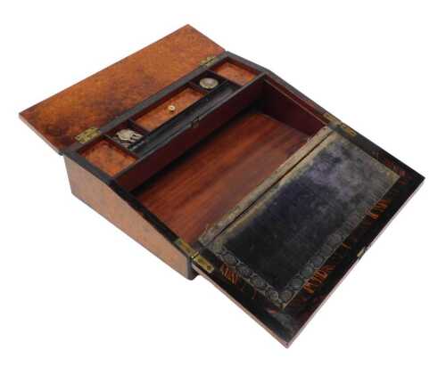 A late 19thC bur wood writing slope, the hinged lid revealing a fitted interior, with space for...