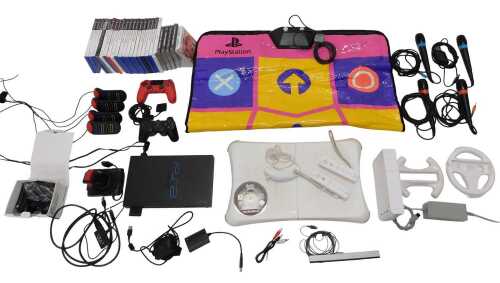 Various computer consoles, gaming consoles, etc., comprising a Playstation PS 2, 32cm wide, a...