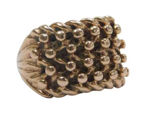 A knot design dress ring, of four bar crossover and pleated decoration, yellow metal stamped 375...