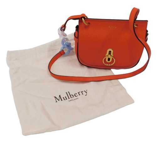 A Mulberry small goat skin Amberley bag, in coral orange, with gilt trim, 21cm wide, with dust bag.