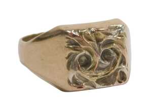 A signet ring, the twist design ring head in bicolour finish, on a yellow metal band, with...