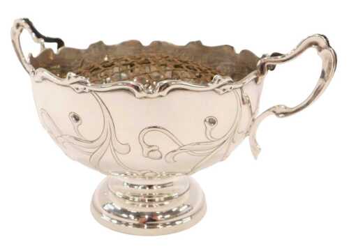 An Edward VII silver rose bowl, with flared rim and S scroll strap handles, inverted circular...