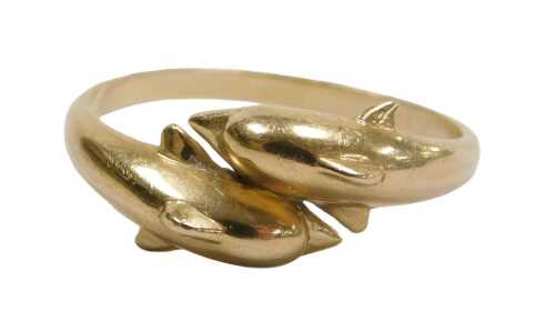 A dolphin dress ring, with two arched dolphins in crossover design, yellow metal stamped 14k,...