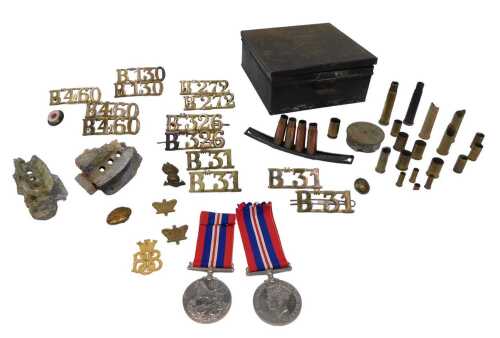 Militaria, to include two WWII 1939-45 medals with ribbons, mortar tail fins, 7cm high, other...