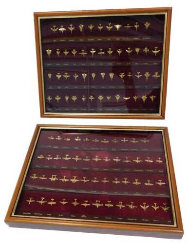 A Danbury Mint framed set of The 100 Greatest Combat Aircraft, pin badges in two cases, to...