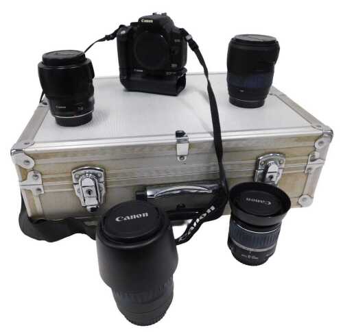 Cameras to include a Canon 350D digital, in associated fitted case, with a quantity of various...