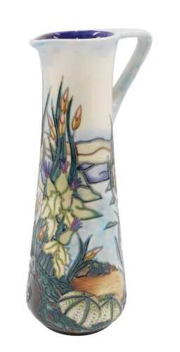 A Moorcroft pottery Limia pattern ewer, 24cm high.