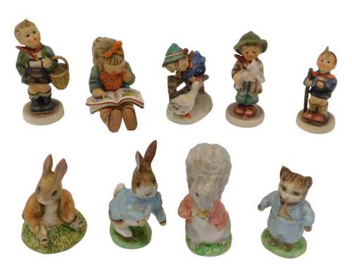 Various Goebel Hummel figures, boy with basket, 13cm high, girl reading, various others, and a...