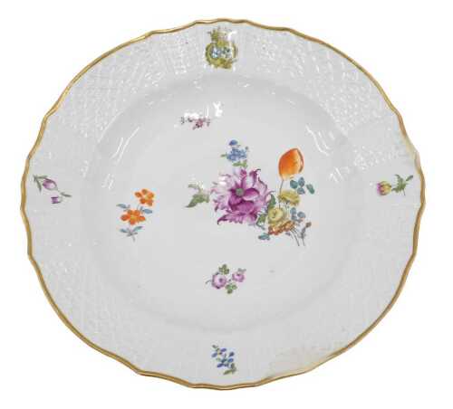 A 19thC Dresden porcelain dish, decorated with flower sprays to the centre, the moulded border...