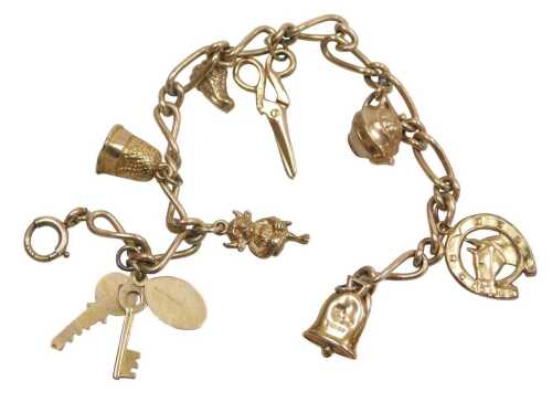 A 9ct gold figaro link charm bracelet, with assortment of charms, to include bell, horses head,...