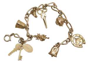 A 9ct gold figaro link charm bracelet, with assortment of charms, to include bell, horses head,...