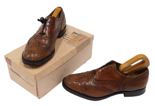 A pair of gentleman's Church's brown burr wood leather textured shoes, with trees, outer bag and...