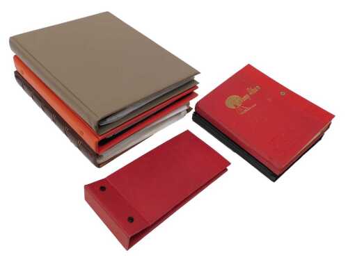 Various stamps and related items, a 606 stamp album in red, containing a quantity of collectors...