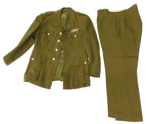 A vintage British Army No. 2 service dress khaki tunic and trousers, the tunic with Royal Tank...
