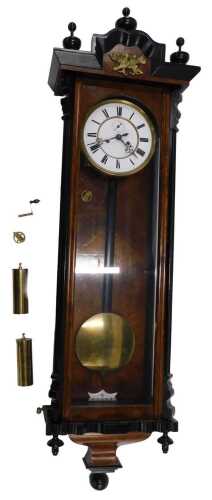 A 19thC walnut and ebonised Vienna wall clock, the 18cm diameter Roman numeric dial with a...