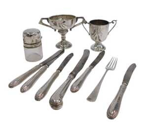 A George V silver trophy, with plain bowl flanked by angular handles, on inverted stem and...