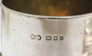 A George V silver trophy, with plain bowl flanked by angular handles, on inverted stem and... - 5