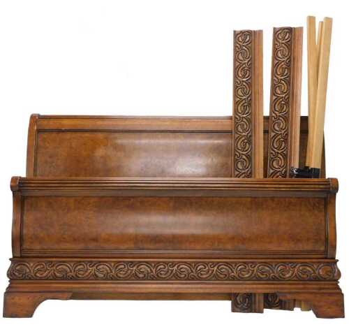 A bespoke hand crafted 20thC walnut and oak sleigh bed, of large proportion, comprising...