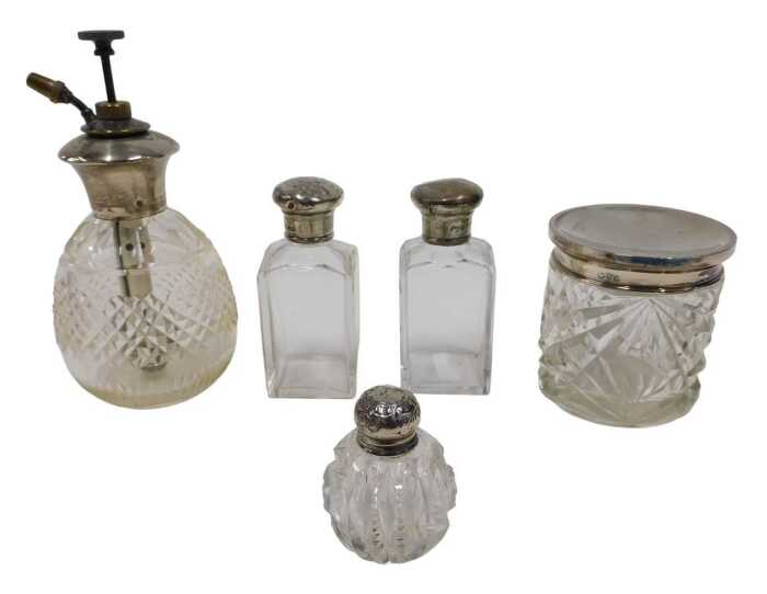 A George V silver cut glass dressing table jar, with plain lid, on circular body hobnail cut,...