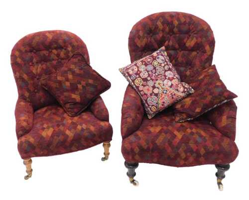A matched pair of late Victorian or early Edwardian lady's and gentleman's chairs, each with turned front legs, in later button back diamond material, 98cm high, etc., with additional cushions.