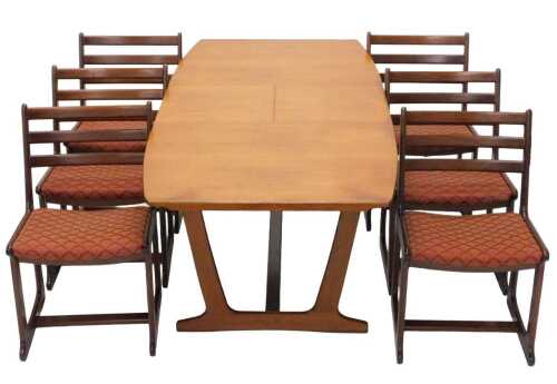 A Portwood Townhouse teak dining room suite, comprising draw leaf table, when closed 73cm high,...