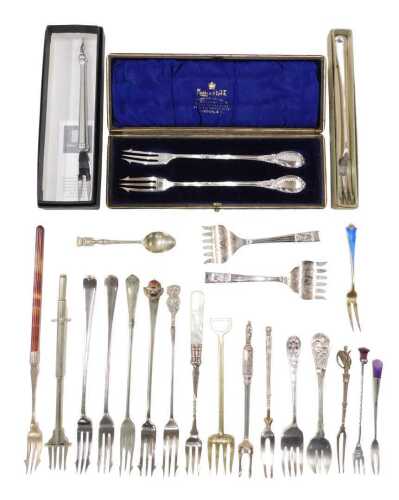Various pickle and serving forks, to include one marked Sheffield plate, with bright cut six...