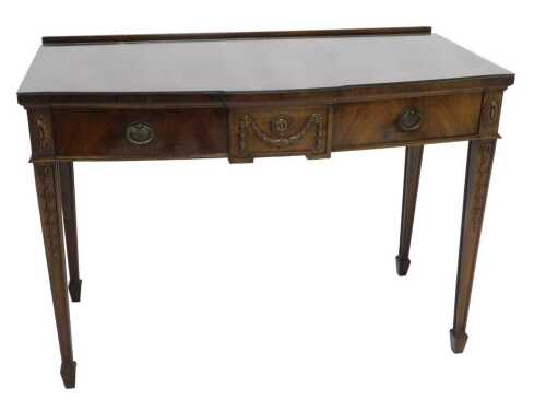 An early 20thC Adam style mahogany serving table, of inverted form, with two frieze drawers,...