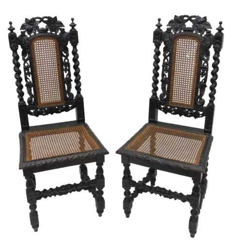 A pair of late 19thC oak Carolean style high back dining chairs, each with bergere arched splats...