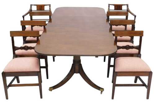 A Regency style dining room suite, comprising twin pedestal dining table, each section with...