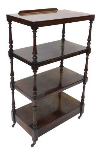 A Victorian mahogany buffet whatnot, of rectangular form, each section held on baluster columns...